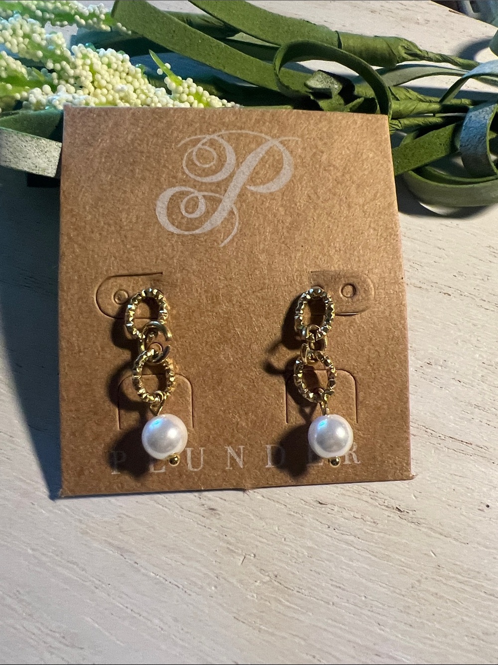 Plunder gold tone stud dangle earrings